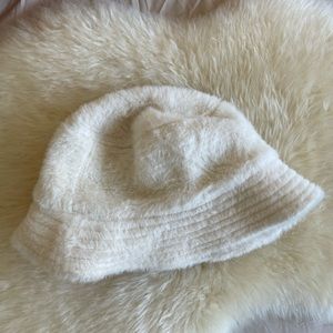 White fuzzy faux fur bucket hat
